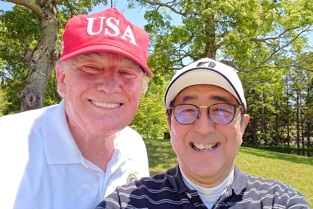 Japan's Prime Minister Shinzo Abe poses for a selfie with US President Donald Trump. Photo: Reuters