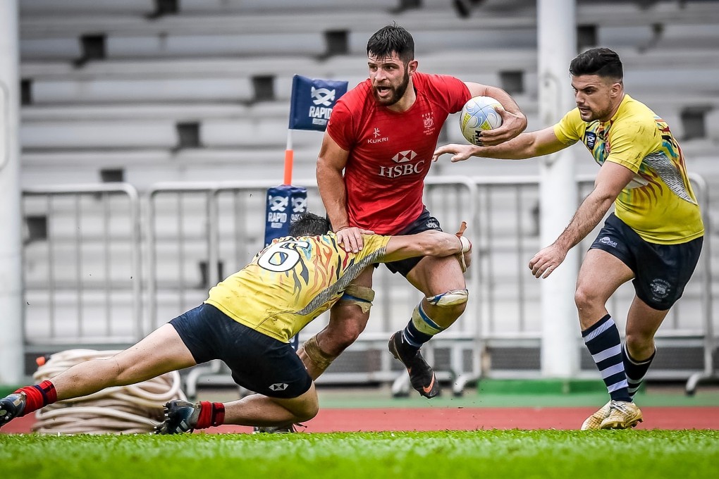 Kane Boucaut tries to break a tackle while playing for the Hong Kong national team against the South China Tigers. Photo: HKFC