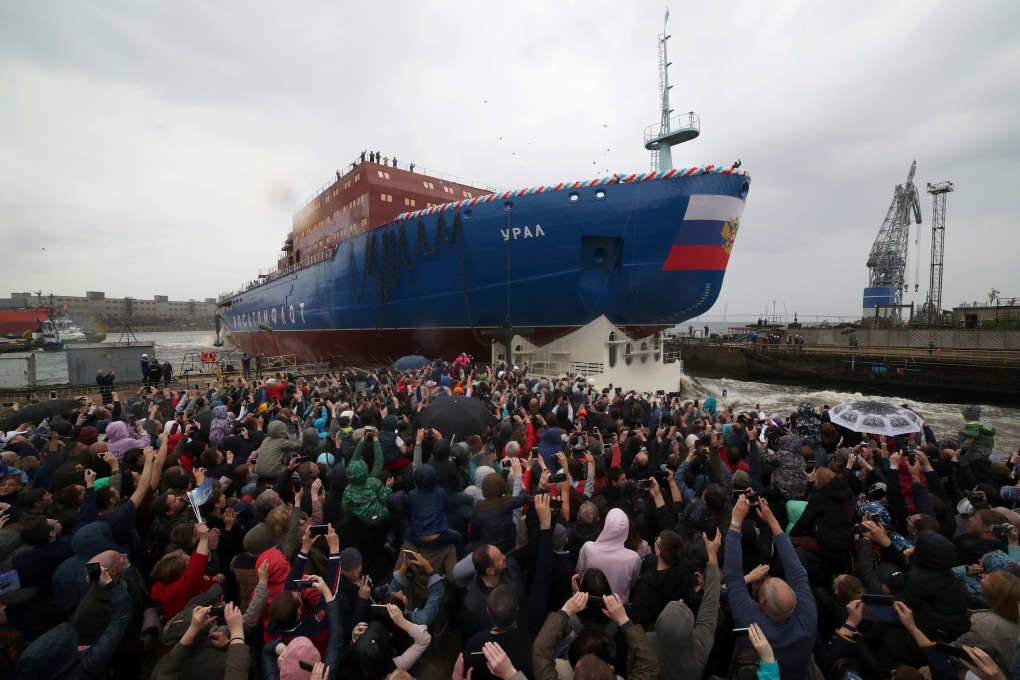 People attend the float out ceremony of the nuclear-powered icebreaker Ural at the Baltic Shipyard in St. Petersburg, Russia, on Saturday. Photo: Reuters