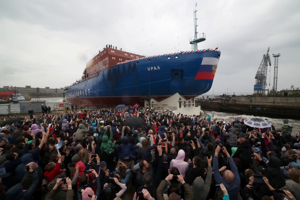 People attend the float out ceremony of the nuclear-powered icebreaker Ural at the Baltic Shipyard in St. Petersburg, Russia, on Saturday. Photo: Reuters