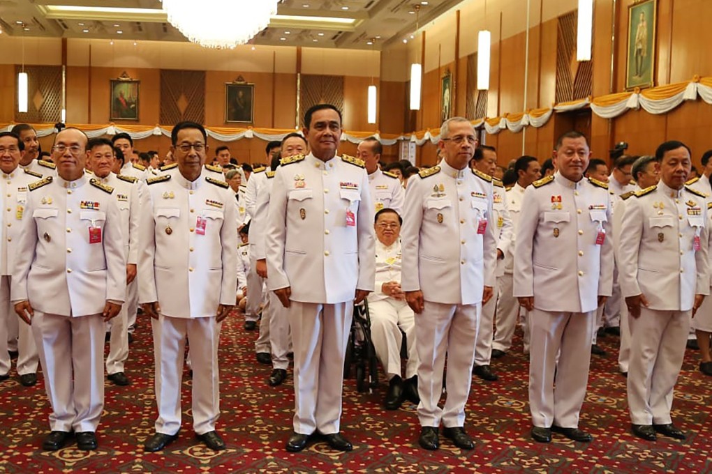 PM Prayuth Chan-ocha (centres) attends the opening of parliament in Bangkok on May 24. Photo: AFP