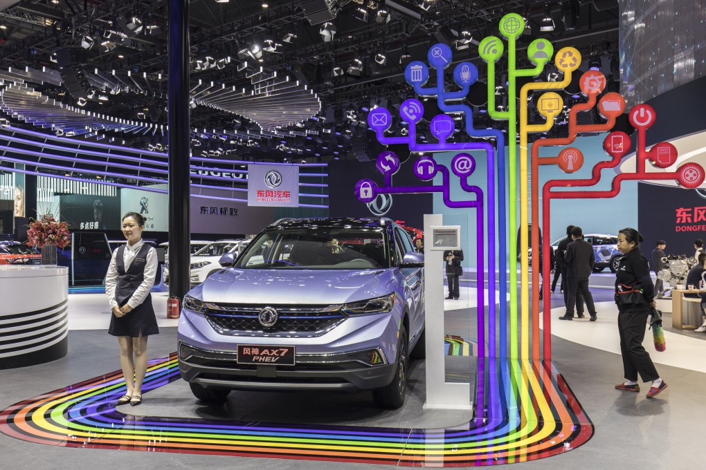 Dongfeng Motor Group’s AX7 plug-in hybrid electric vehicle (PHEV) stands on display at the Auto Shanghai 2019 show in Shanghai on Wednesday, April 17, 2019. Photo: Bloomberg