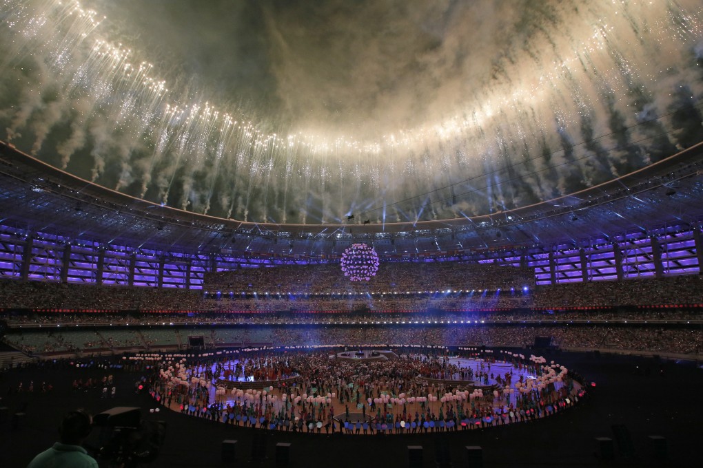 Fireworks explode above the Baku Olympic stadium during the closing ceremony of the 2015 European Games. Arsenal and Chelsea are both unhappy with the selection of Baku as host city for the final of the Europa League. Photo: AP