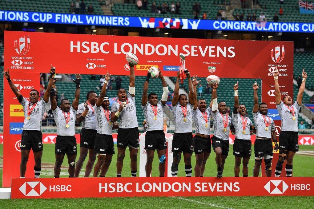 Fiji players celebrate winning the London Sevens to put them top of the World Series with one round remaining this season. Photo: AFP