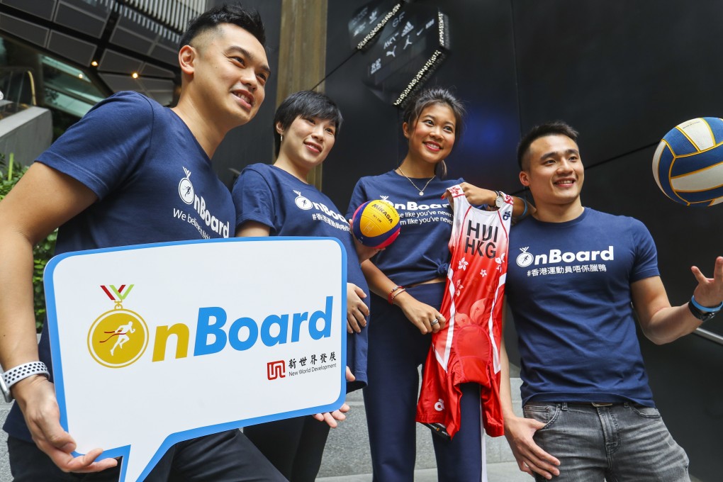 OnBoard co-founders Garrick Lau (left) and Gary Fung (right), flank two beneficiaries of the scheme Joanne Shum and Vincci Hui. Photo: Edmond So