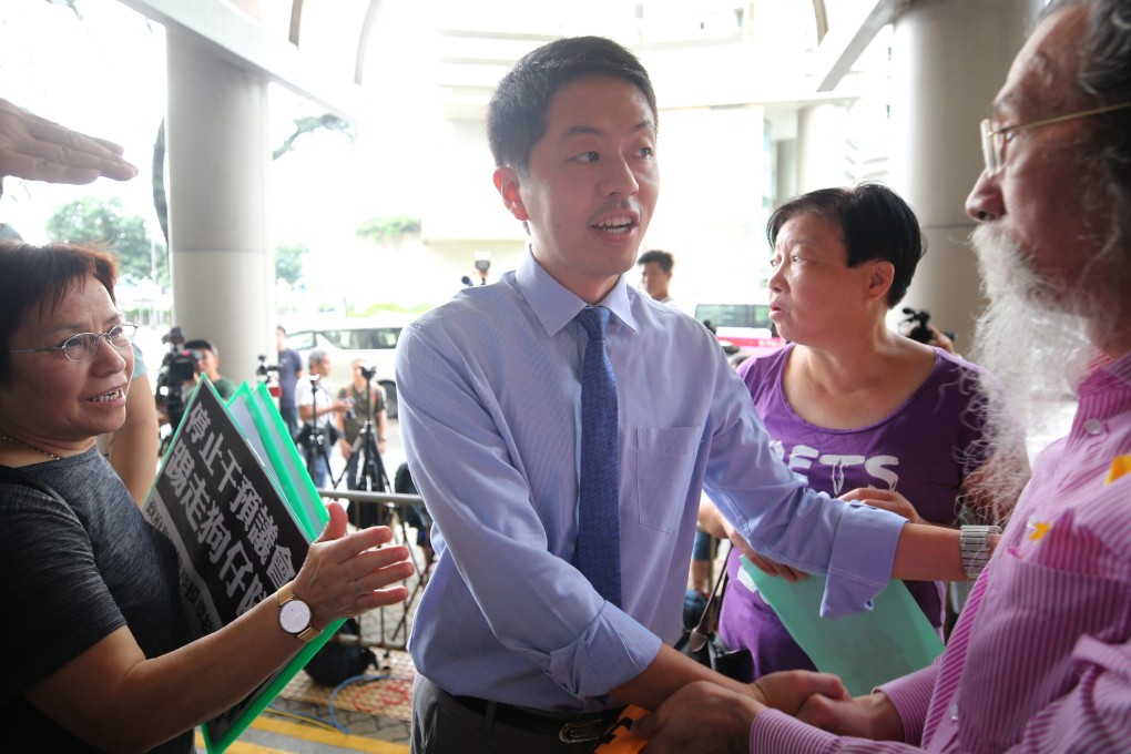 Hong Kong lawmaker Ted Hui has been found guilty of assault for snatching a public official’s phone. Photo: Winson Wong