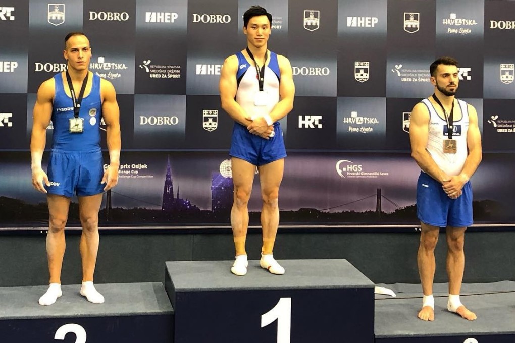 Shek Wai-hung celebrates winning gold on the podium at the World Cup in Osijek, Croatia. Photos: Shek Wai-hung/Facebook