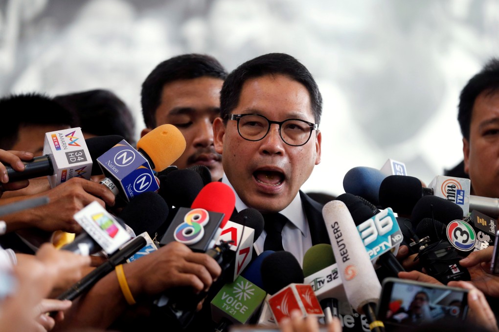 Palang Pracharat party leader Uttama Savanayana talks to reporters meeting the Democrat party leader in Bangkok on Monday. Photo: Reuters