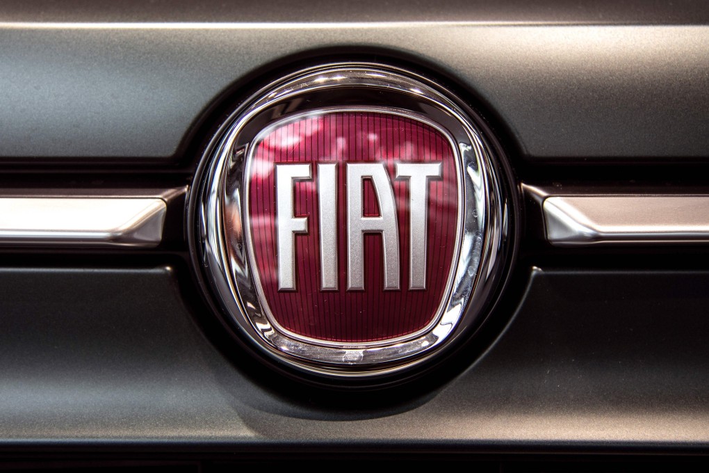 A Fiat logo at a car dealer in Turin on Monday. Photo: AFP