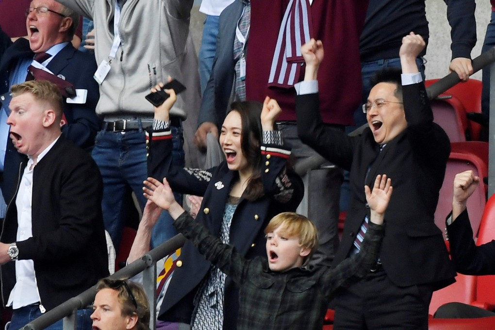 Aston Villa co-owner Tony Xia celebrates the club’s second goal in the Wembley stands. Photo: Reuters