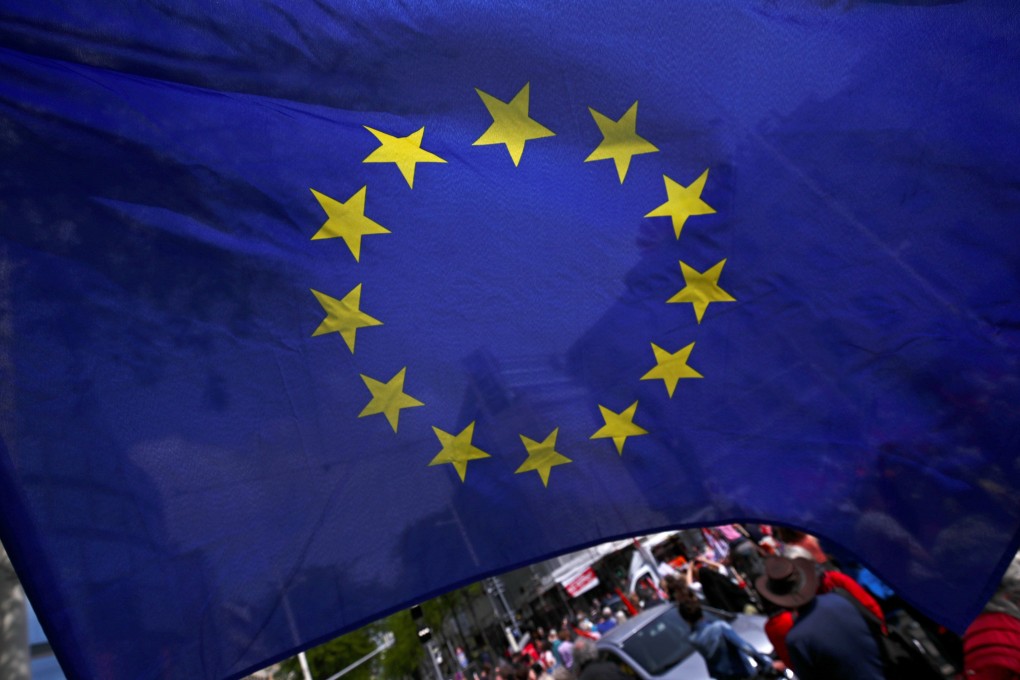 An European Union flag flutters during a rally against nationalism in the EU, in Vienna, Austria. Photo: Reuters