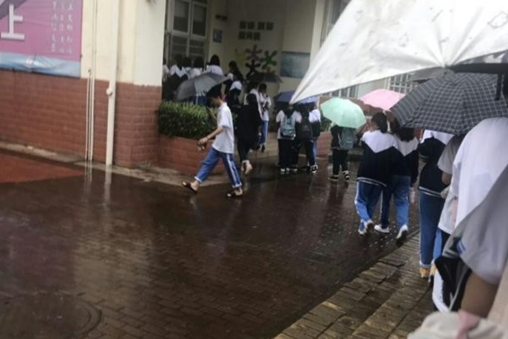Haikou Experimental Middle School pupils queue at the new facial recognition gate at the entrance to their dormitory. Photo: Weibo