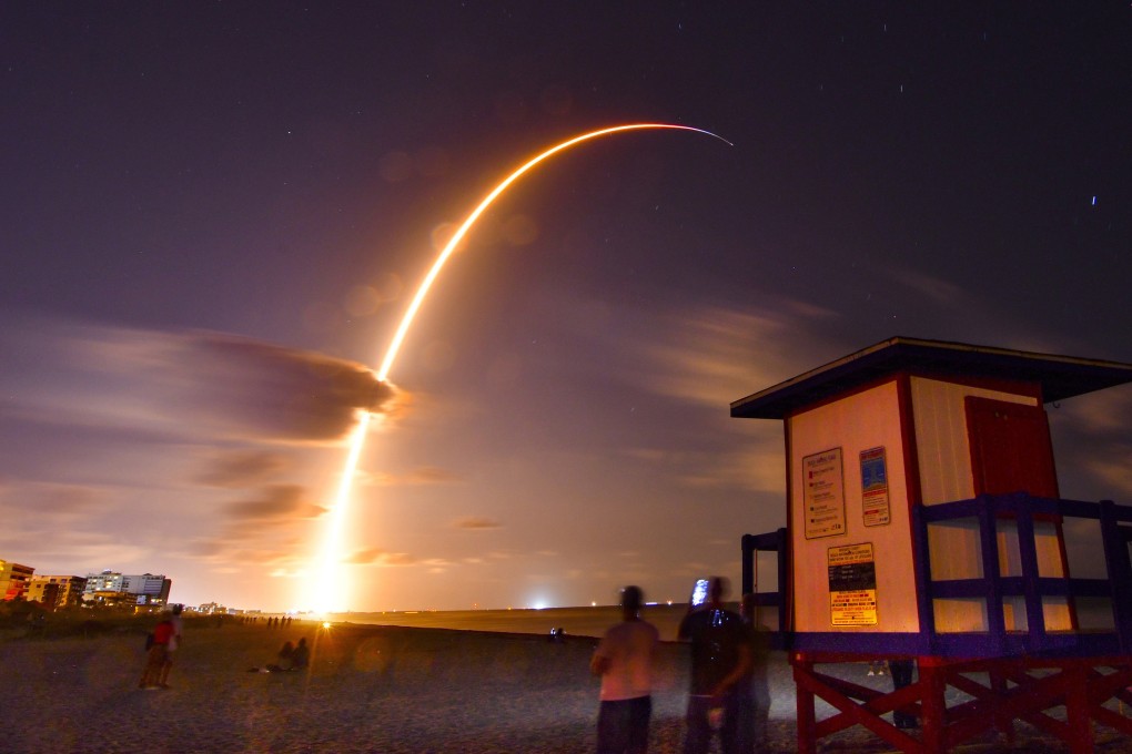 A Falcon 9 SpaceX rocket carrying 60 satellites for SpaceX's Starlink broadband network lifts off from Space Launch Complex 40 in Florida on Thursday. Photo: Florida Today via AP