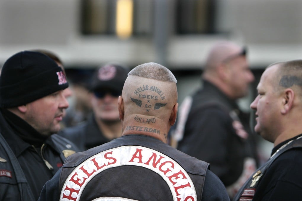 Dutch Hells Angels wait outside the Amsterdam Osdorp courthouse. Photo: AFP