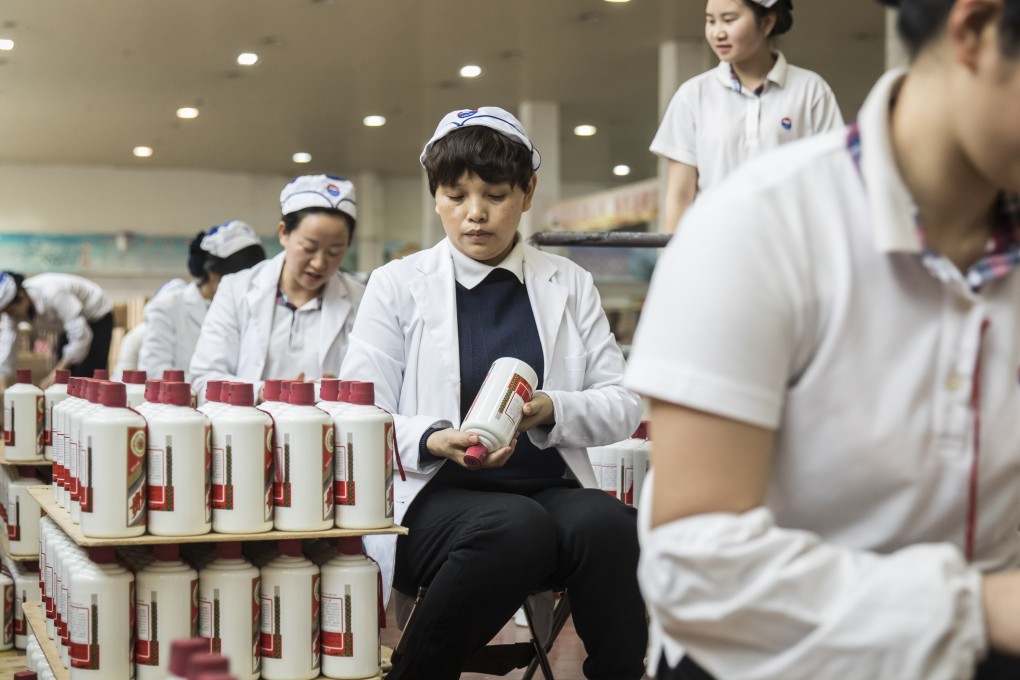 Employees at the Kweichow Moutai factory in the town of Maotai in Renhuai, Guizhou province, China. Photo: Bloomberg