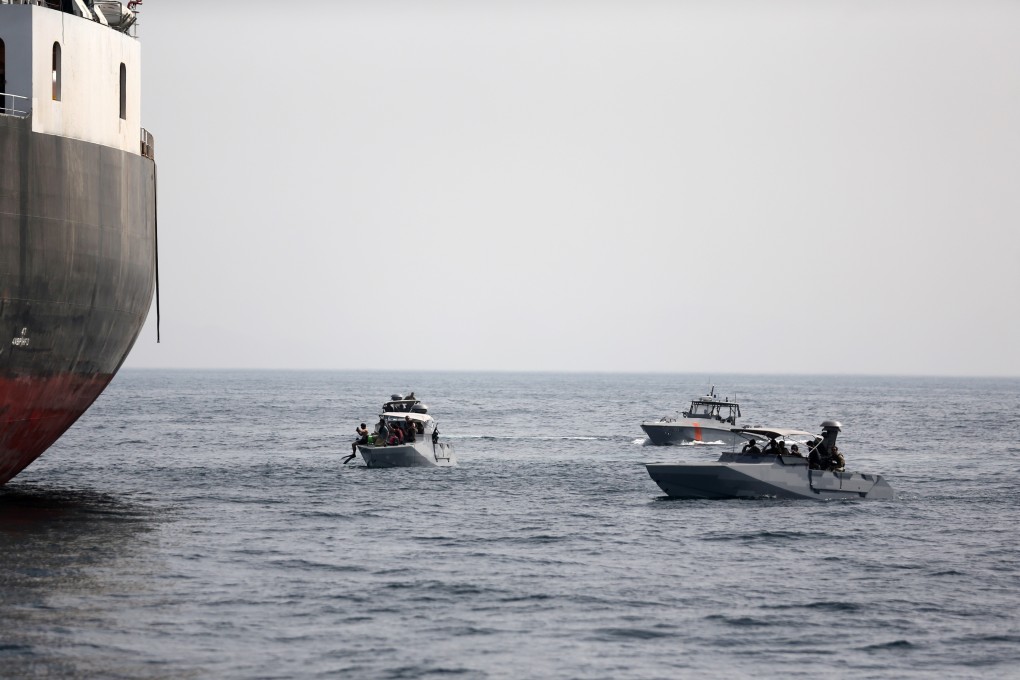 UAE Navy boats are seen next to the Saudi tanker Al Marzoqah off the Port of Fujairah, UAE. Photo: Reuters