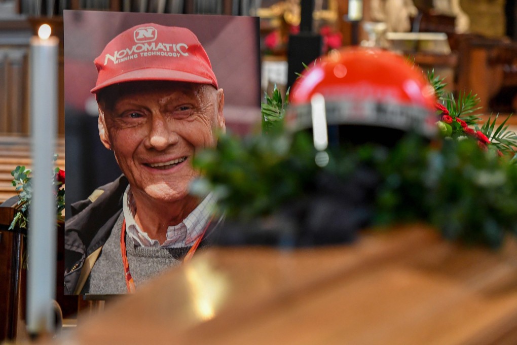 The helmet of the former Formula One driver Niki Lauda sits on top of his coffin and next to his portrait during a funeral service at St Stephen's Cathedral (Stephansdom) in Vienna. Photo: AFP