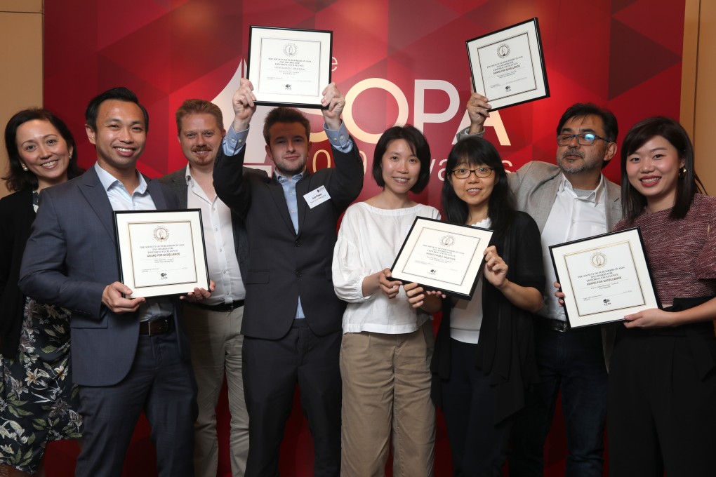 (From left) Post employees Lynn Lee, Chieu Luu, Mat Booth, John Power, Su Xinqi, Stella Lee, Marcelo Duhalde and Rachel Cheung. Photo: Xiaomei Chen
