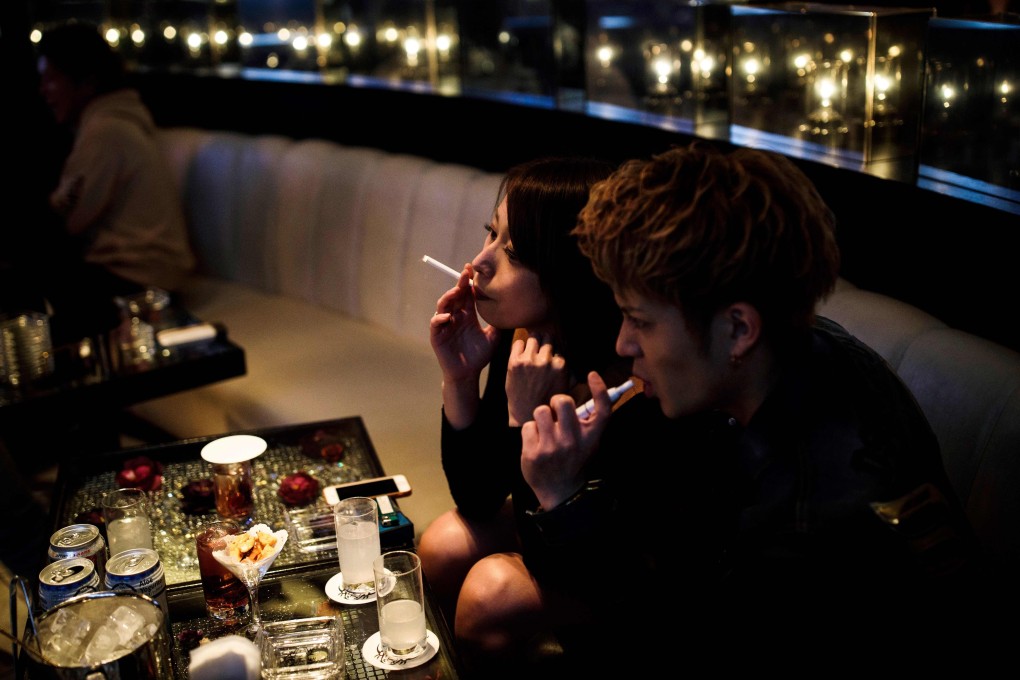 Patrons at a club in Tokyo’s Kabukicho district. Photo: AFP