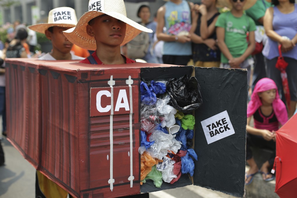 A 2015 file photo showing environmental activists in the Philippines protesting to demand Canada take back containers of waste that had been sent to the Southeast Asian nation. Photo: AP