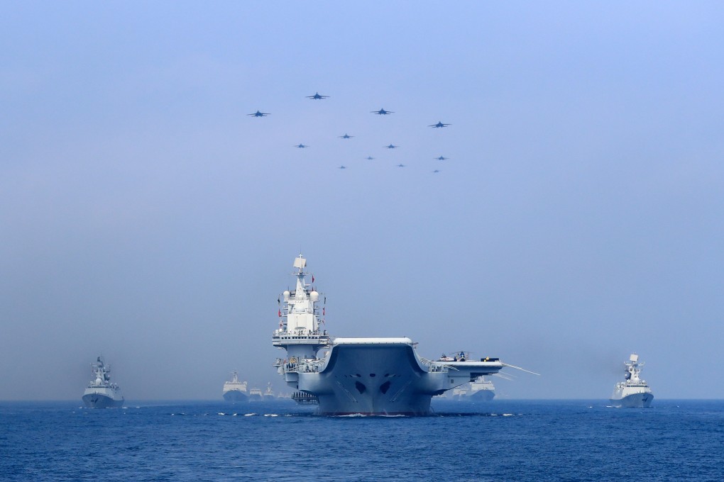 Chinese warships sail through the South China Sea. Photo: Reuters