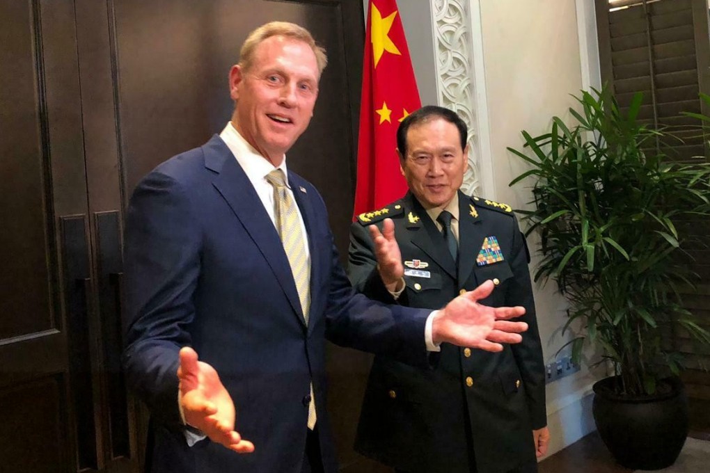 Acting US Defence Secretary Patrick Shanahan meets Chinese Defence Minister Wei Fenghe on the sidelines of the Shangri-La Dialogue in Singapore on Friday. Photo: AP