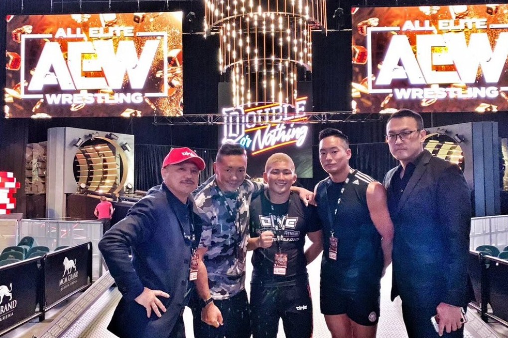 Michael Nee (right) with OWE’s Japanese wrestlers ahead of their match at AEW’s Double or Nothing. Photo: OWE