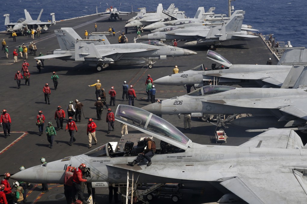 F/A-18 Super Hornet fighter jets on the deck of the USS Ronald Reagan in the South China Sea in 2018. Photo: AP