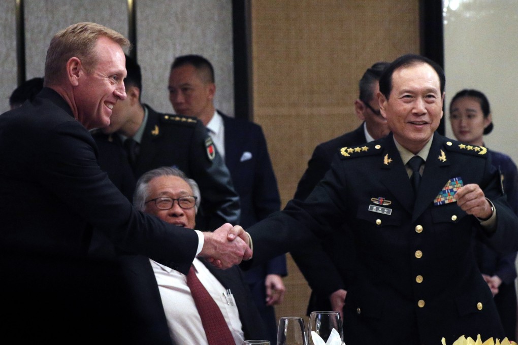 Acting US secretary of defence Patrick Shanahan (left) and Chinese Minister of Defence General Wei Fenghe meet on rhe sidelines of the International Institute for Strategic Studies Asia Security Summit in Singapore on Saturday. Photo: EPA-EFE