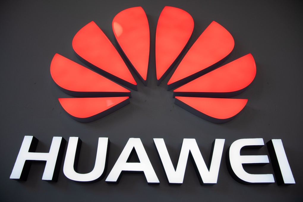 A Huawei logo next to a Huawei store in a shopping centre in Beijing, China, 20 May 2019. Photo: EPA-EFE