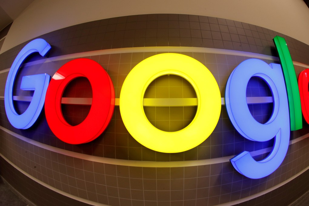 An illuminated Google logo inside an office building in Zurich. Photo: Reuters