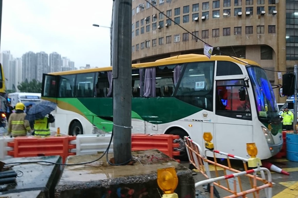 Shattered windows on the coach after the collision with a bus in Kowloon Bay on Monday morning. Photo: Facebook