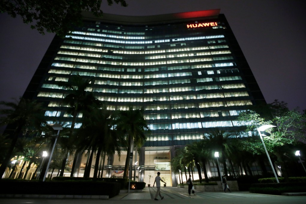 Employees walk past a research and development building at Huawei Technologies’ headquarters in Shenzhen, Guangdong province, on May 29, 2019. Photo: Reuters