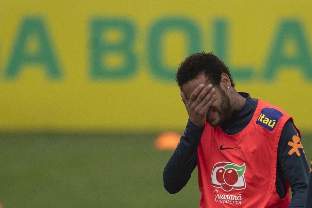 Brazil and Paris St Germain star covers his eyes during training at the Granja Comary sport complex in Teresopolis, Brazil. Photo: AFP