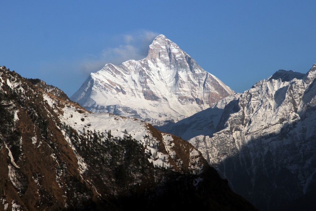 Nanda Devi mountain is seen from Auli town, where eight mountaineers are still missing. Photo: Reuters