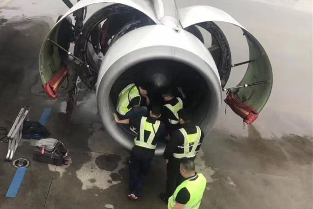Ground crew inspect a China Southern Airlines plane after an 80-year-old woman threw a handful of coins into the engine in 2017. Photo: Handout