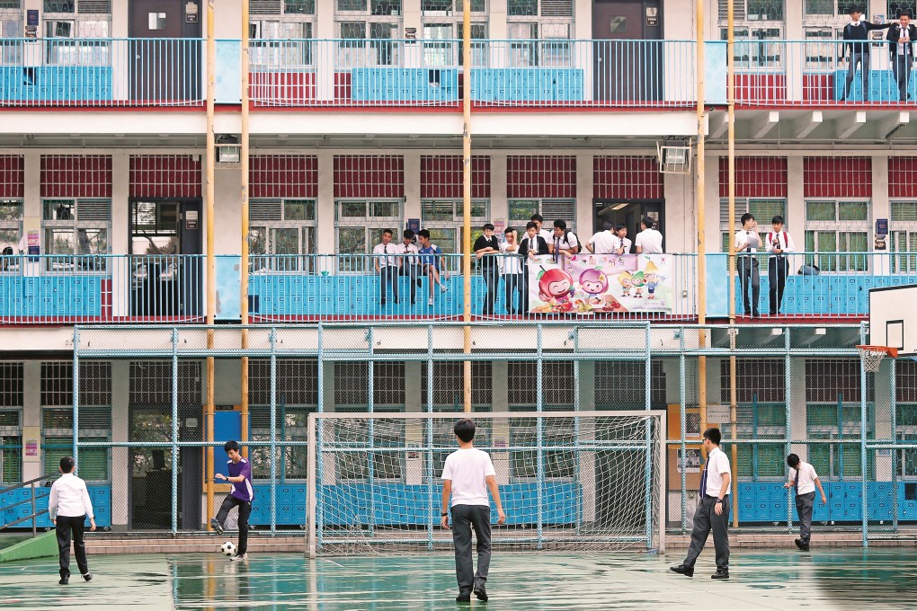 Students enjoy a break from lessons at Wah Yan College in Wan Chai, Hong Kong. A report by The Zubin Foundation reveals that thousands of children from low-income ethnic minority families could potentially be missing out on scholarships to private and international schools in the city. Photo: Dickson Lee