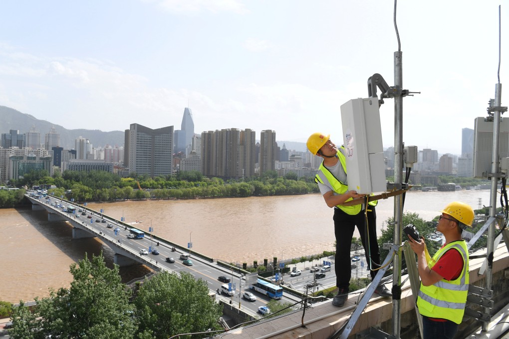 China Telecom technicians test equipment for the carrier’s 5G base station near the Yellow River in Lanzhou, Gansu province, on May 16, 2019. Photo: Reuters