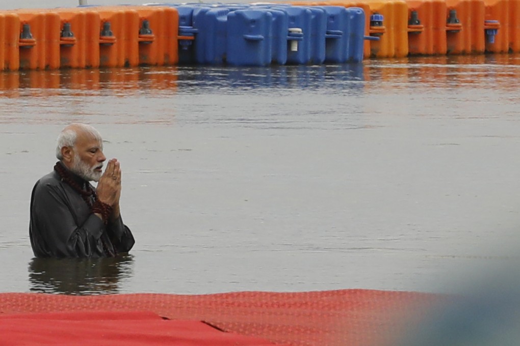 Indian Prime Minister Narendra Modi takes a dip at Sangam, the confluence of the Ganges, Yamuna and mythical Saraswati rivers during the Hindu Kumbh festival in February. Modi, a masterful political performer, won a landslide victory at the recent general elections. Photo: AP