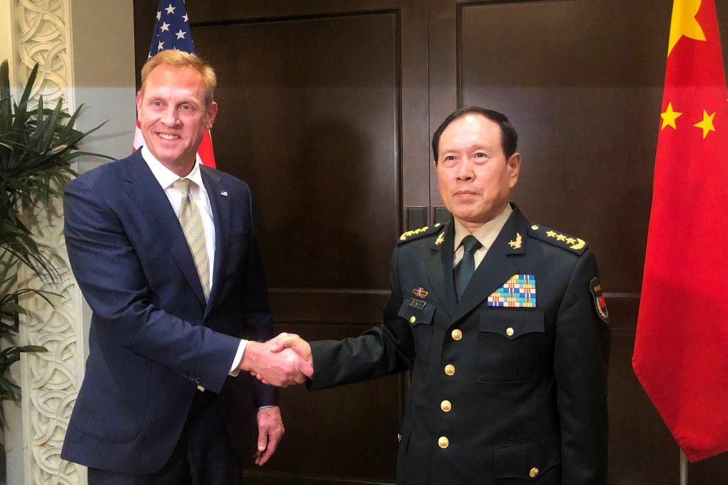 Acting U.S. Defense Secretary Patrick Shanahan and Chinese Defence Minister Wei Fenghe meet before the start of their meeting in Singapore on the sidelines of the Shangri-La Dialogue. Photo: Reuters