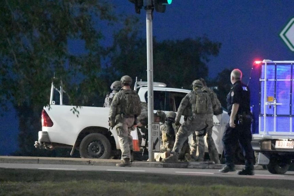 Armed police respond to the shooting in Darwin. Photo: Twitter