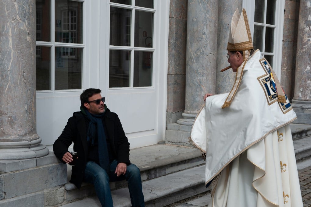 Director Francois Ozon (left) and actor Francois Marthouret on the set of By the Grace of God.