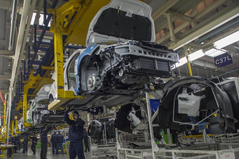 The assembly line of Changan Ford Automobile Corporation (CFA), in Chongqing on March 31, 2014. Photo: Xinhua