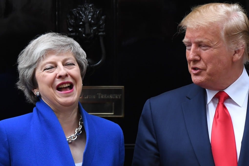Theresa May, outgoing British prime minister, welcomes US President Donald Trump to London. Photo: Bloomberg