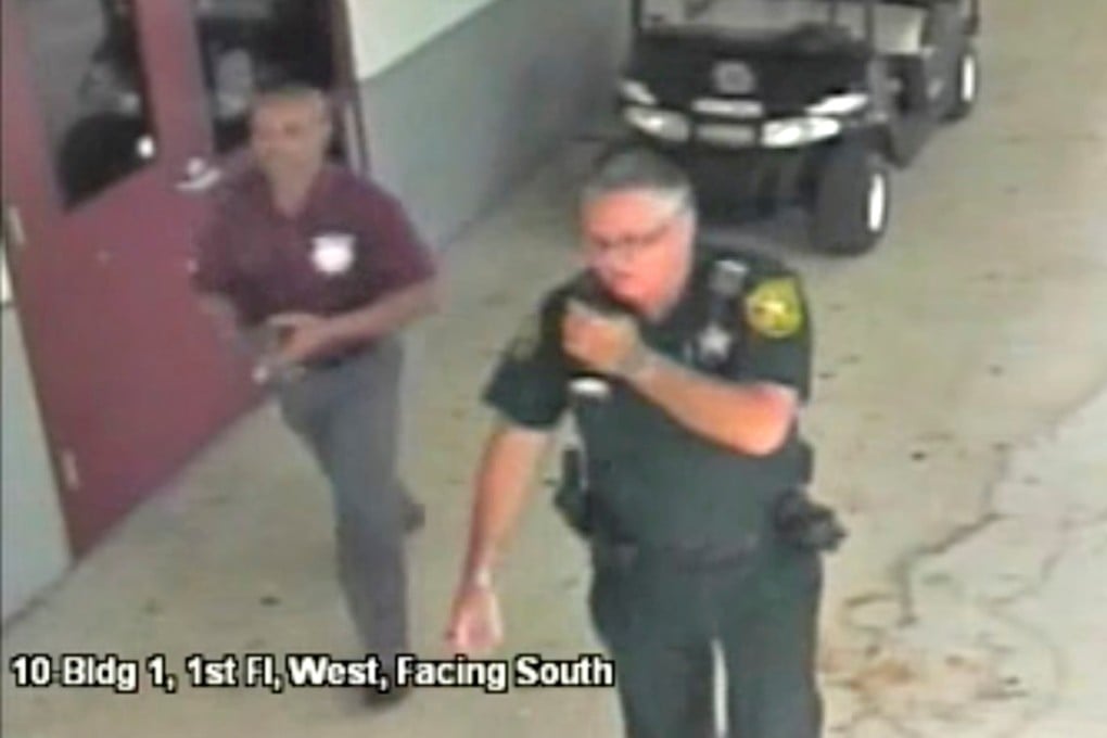 Then-Broward County Sheriff's Deputy Scot Peterson in a still image captured from the school surveillance video in March 2018. Photo: Broward County Sheriff's Office via Reuters
