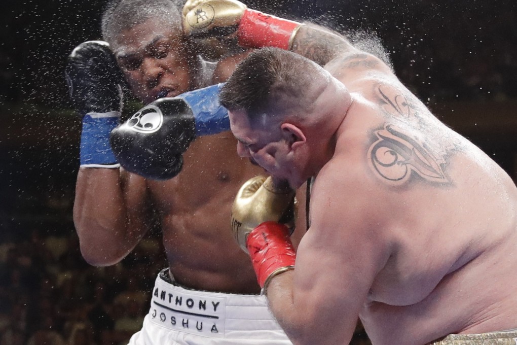 Andy Ruiz exchanges punches with Anthony Joshua during the seventh round in New York. Ruiz went on to stop Joshua and take his heavyweight titles. Photo: AP