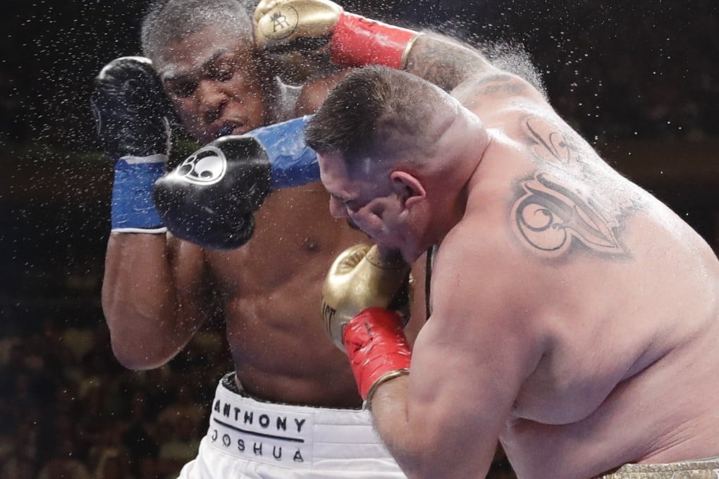 Andy Ruiz exchanges punches with Anthony Joshua during the seventh round in New York. Ruiz went on to stop Joshua and take his heavyweight titles. Photo: AP