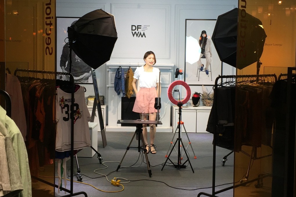 Ding Xiaoping showcases clothes for Dongdaemun Fashion Wholesale Market. Photo: Crystal Tai