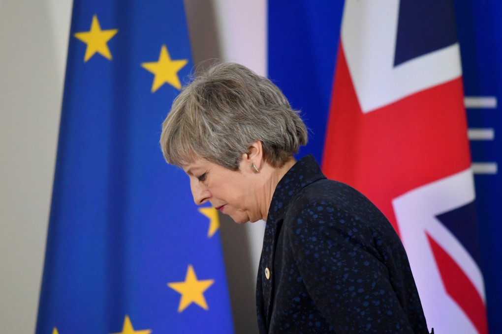 Britain's Prime Minister Theresa May leaves after giving a news briefing in Brussels, Belgium, in March. Photo: Reuters