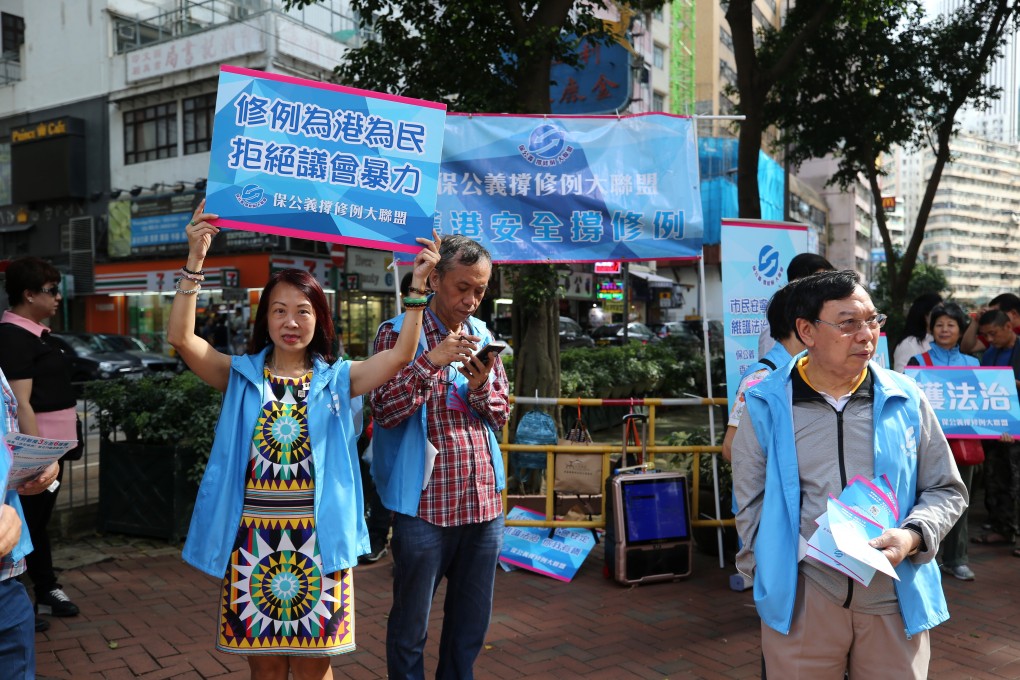 Supporters of the Hong Kong government’s move to amend the fugitive transfers law and widen extradition arrangements, demonstrate in Wan Chai on June 1. Photo: Winson Wong